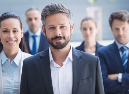 Business professionals collaborating in Ajman